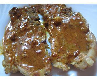 Aguja de cerdo en salsa de cebolla receta